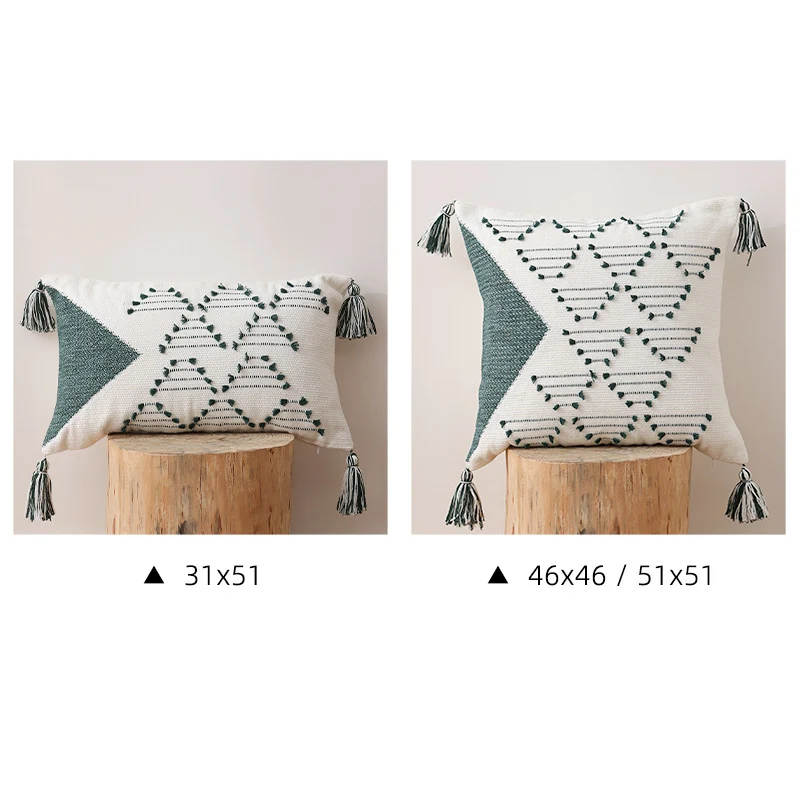Decorative woven cushion cover with geometric tuft-relief and tassels Stornfield