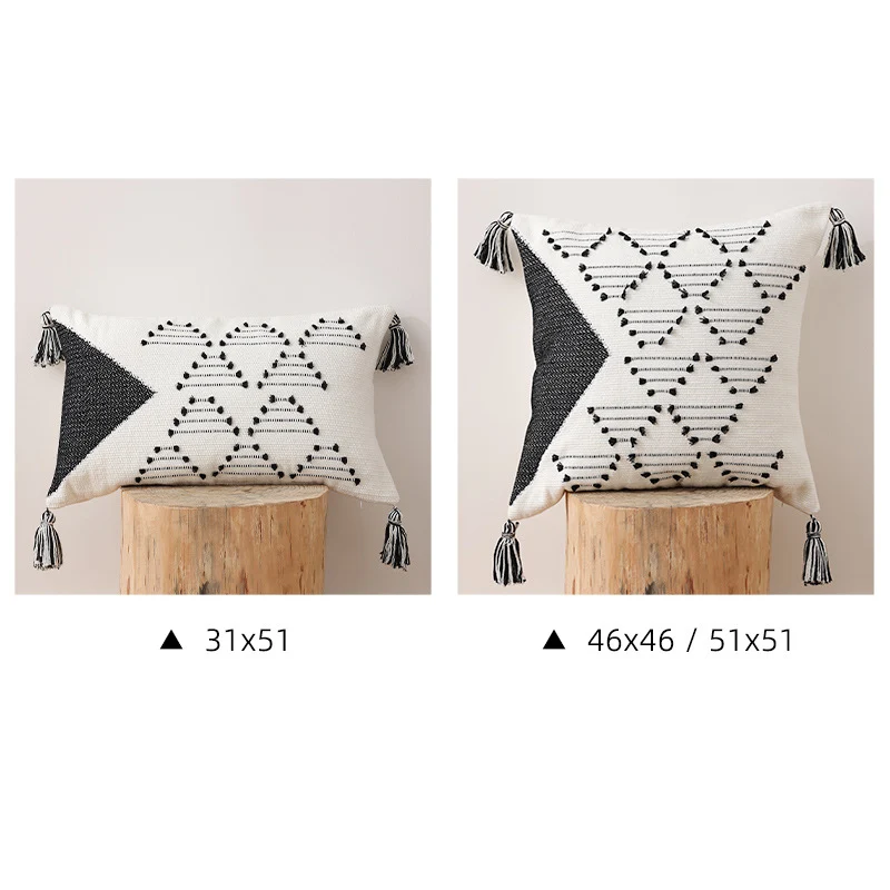 Decorative woven cushion cover with geometric tuft-relief and tassels Stornfield