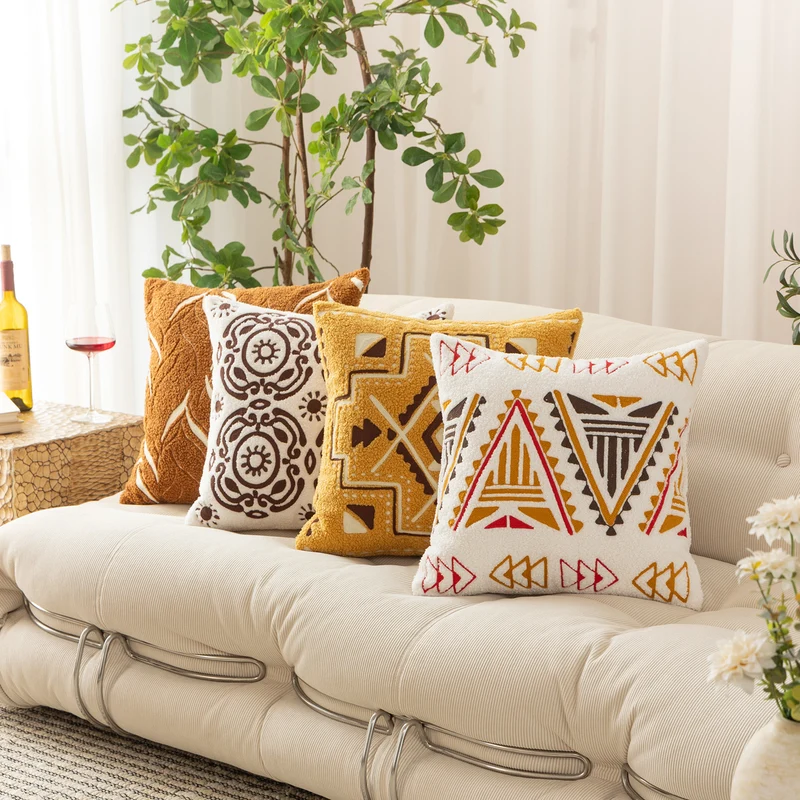 Bouclé pillow with hand-stitched ethnic design and removable cover Stornfield
