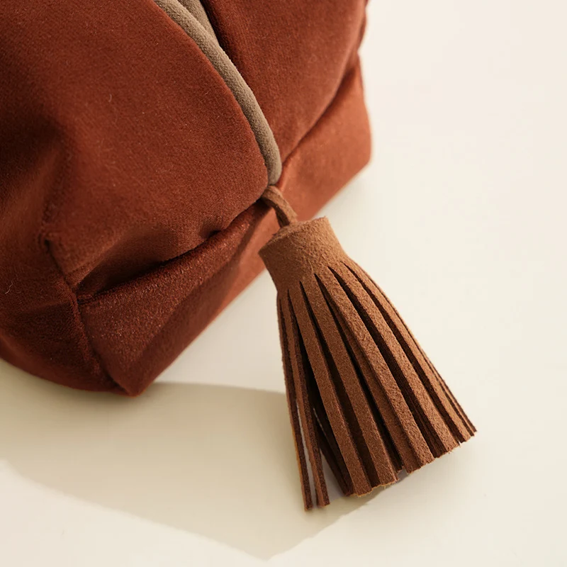 Embroidered tissue box cover made of velvet with tassels Stornfield