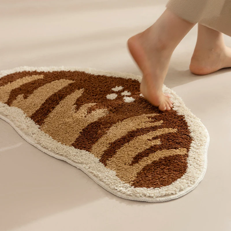Bathroom mat set Stornfield with hand-tufted cookie and bread design, soft microfiber pile and non-slip rubber backing