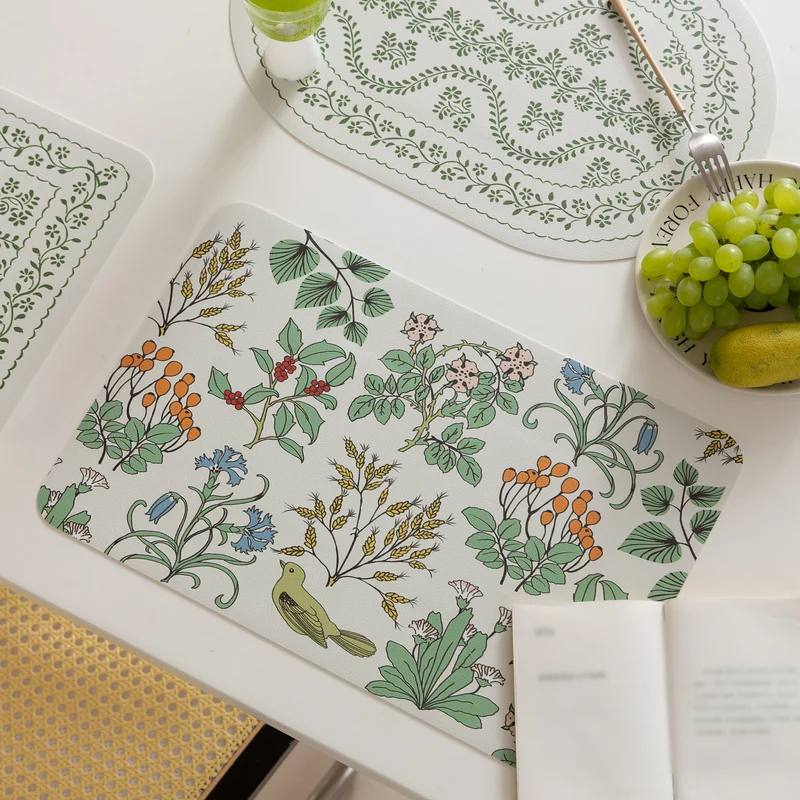 Wipeable table mats made of PU leather with botanical silhouette design Stornfield