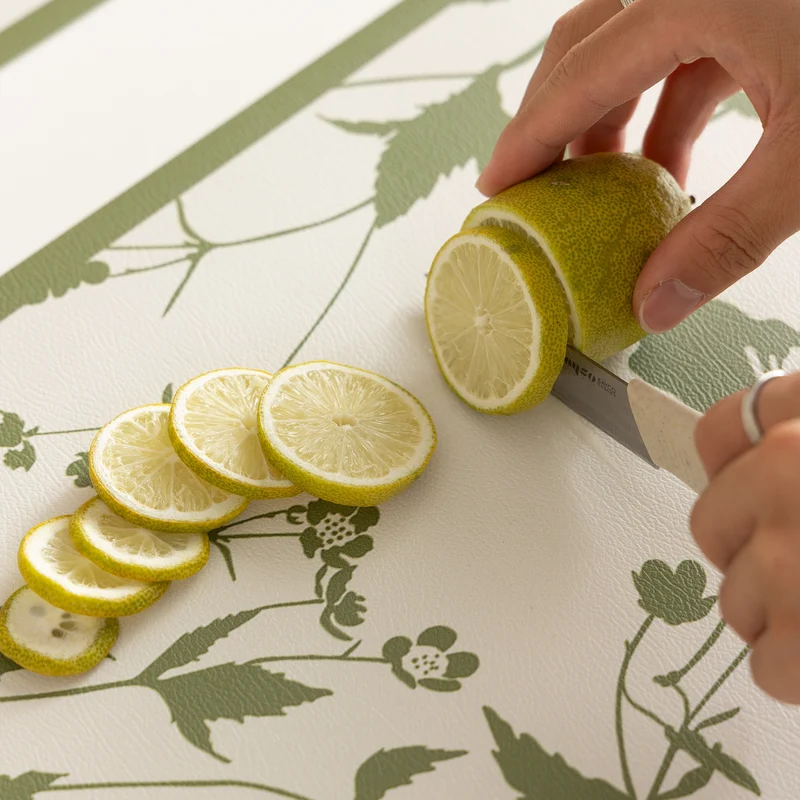 Wipeable table mats made of PU leather with botanical silhouette design Stornfield