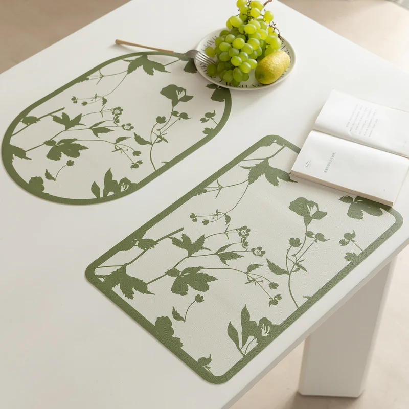 Wipeable table mats made of PU leather with botanical silhouette design Stornfield