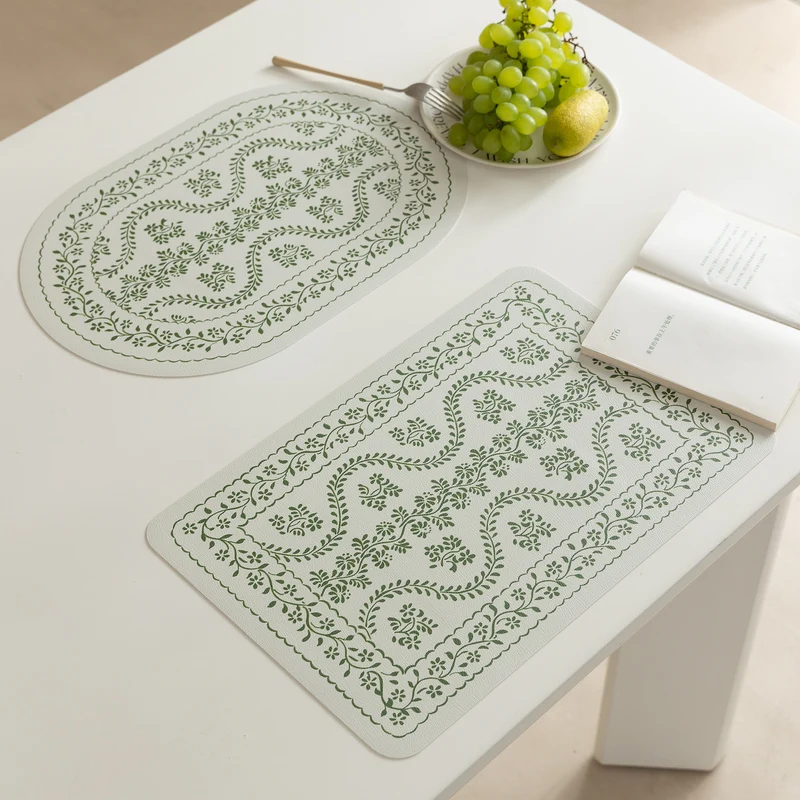 Wipeable table mats made of PU leather with botanical silhouette design Stornfield