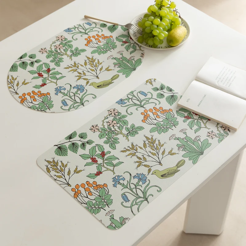Wipeable table mats made of PU leather with botanical silhouette design Stornfield