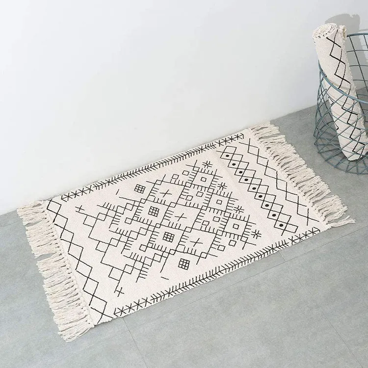 Flat-woven entrance and living room rug with Moroccan diamond jacquard and decorative fringes Stornfield