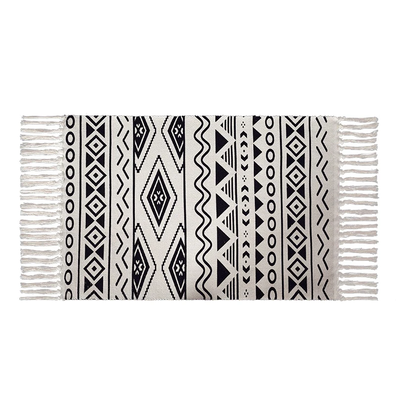Flat-woven cotton blend runner with ethnic diamond jacquard and fringes Stornfield
