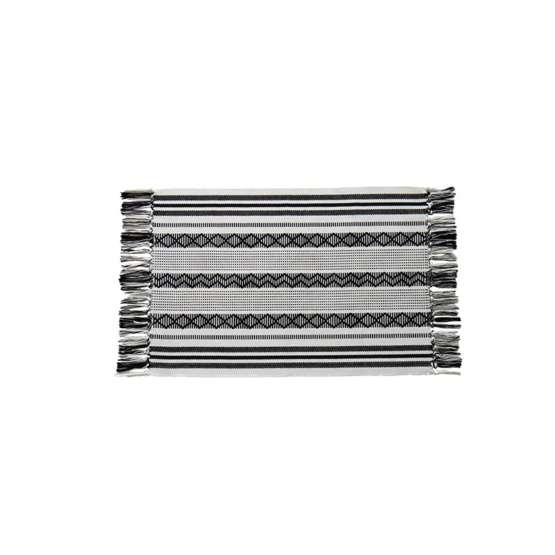 Flat-woven cotton runner with fringes and graphic ethnic stripe pattern Stornfield
