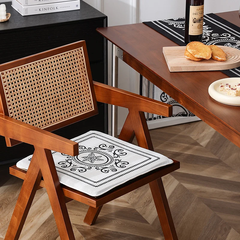 Double-sided seat cushion with ties and decorative jacquard pattern Stornfield