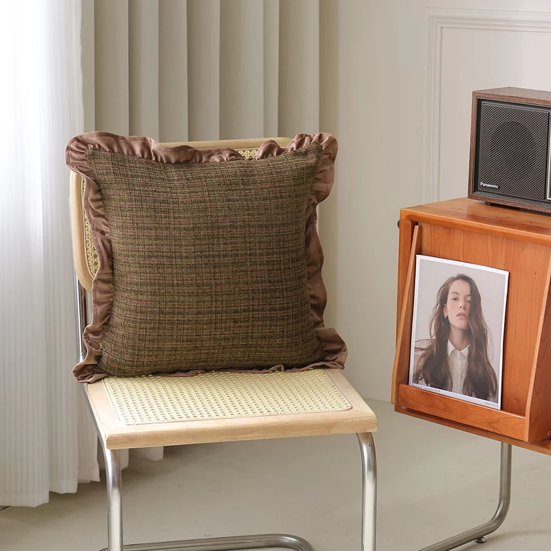 Decorative cushion with woven bouclé structure and velvet ruffled edge Stornfield
