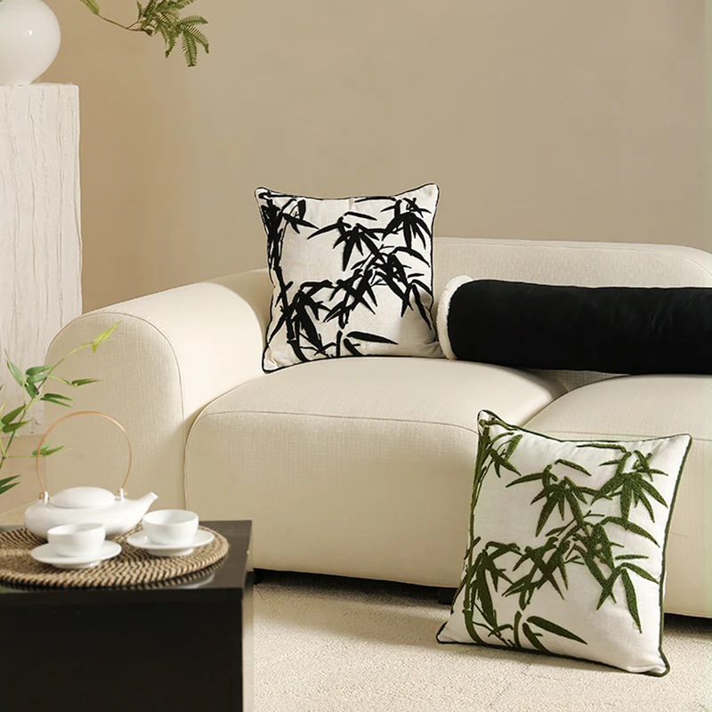 Decorative linen pillow with embroidered bamboo motif Stornfield