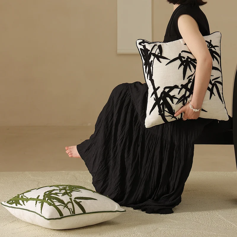 Decorative linen pillow with embroidered bamboo motif Stornfield
