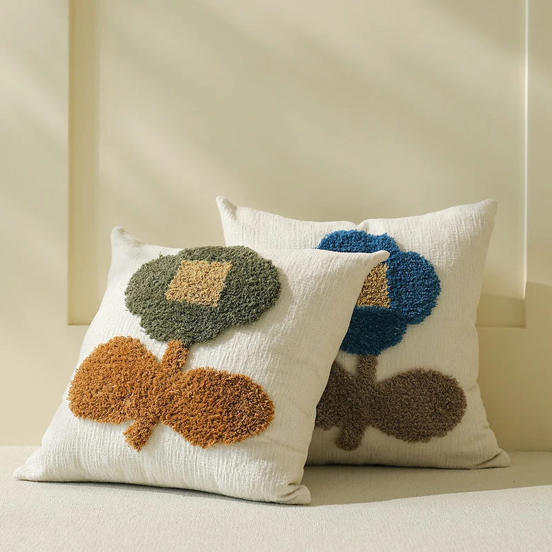 Decorative tufted cushion cover with hand-tufted flower applique Stornfield