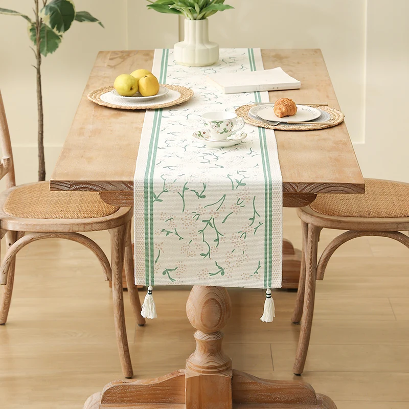 decorative table runner made of woven cotton with tassels Stornfield