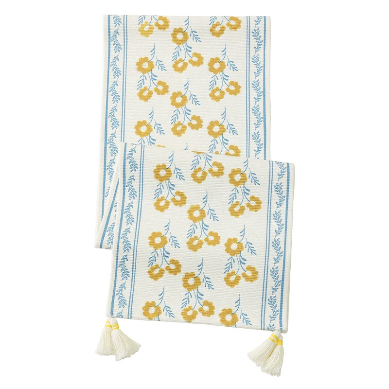 decorative table runner made of woven cotton with tassels Stornfield