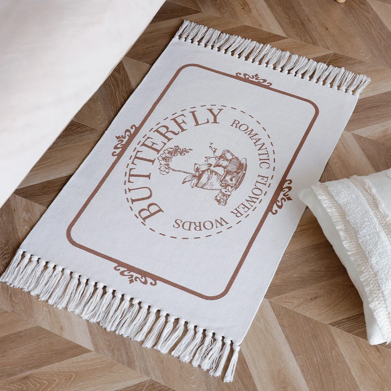Decorative table runner made of cotton with botanical bird print and fringes Stornfield