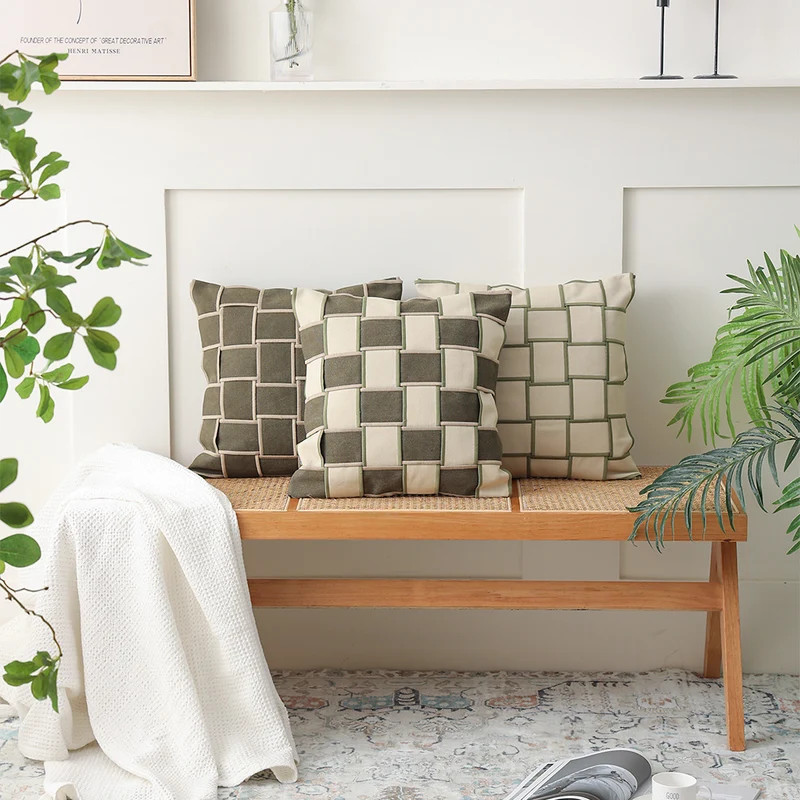 Decorative cushion cover with woven grid relief and contrasting piping Stornfield