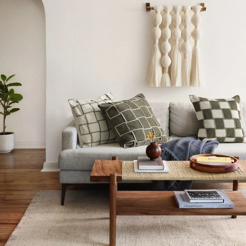 Decorative cushion cover with woven grid relief and contrasting piping Stornfield