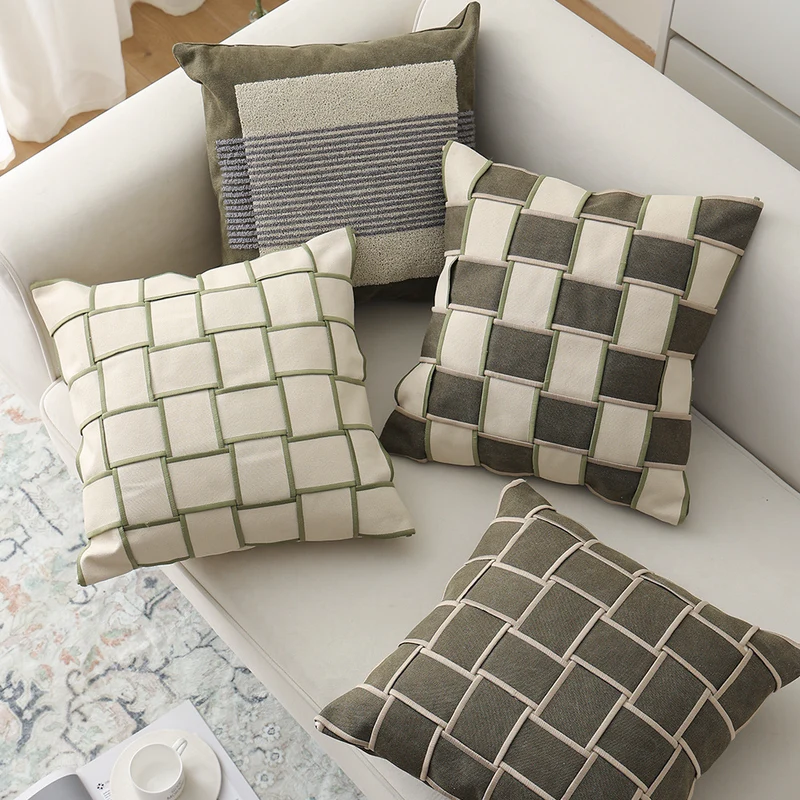 Decorative cushion cover with woven grid relief and contrasting piping Stornfield