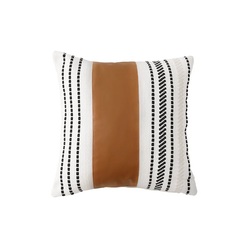 Decorative cushion cover made of faux leather with woven ethnic stripe Stornfield