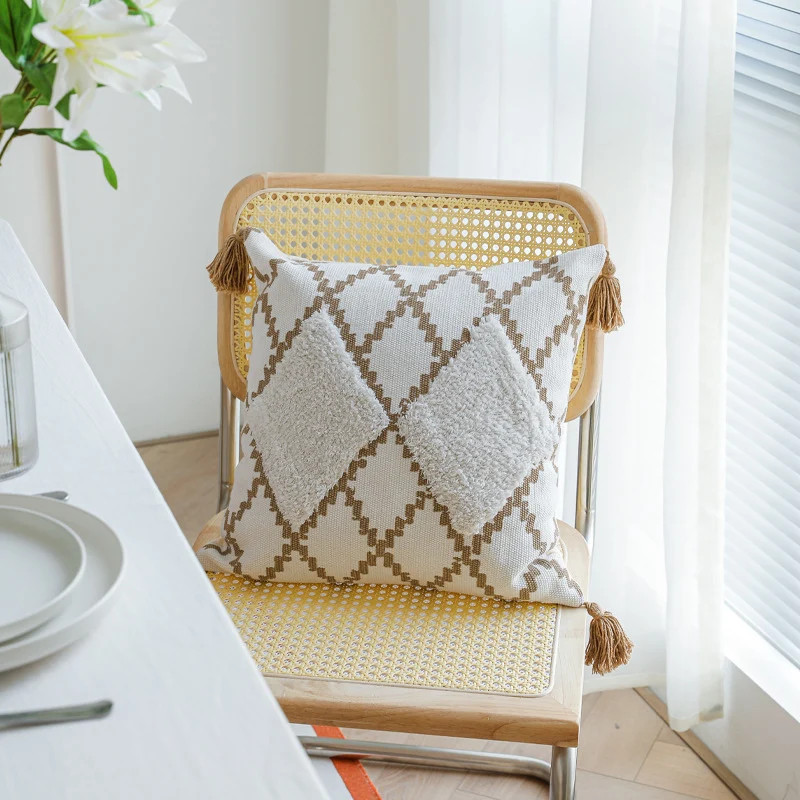 Decorative Boho cushion cover with hand-tufted diamond relief, tassels, and woven cotton blend Stornfield