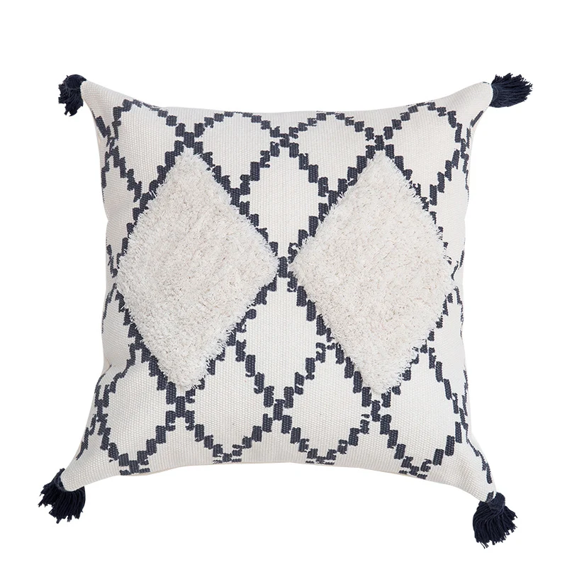 Decorative Boho cushion cover with hand-tufted diamond relief, tassels, and woven cotton blend Stornfield