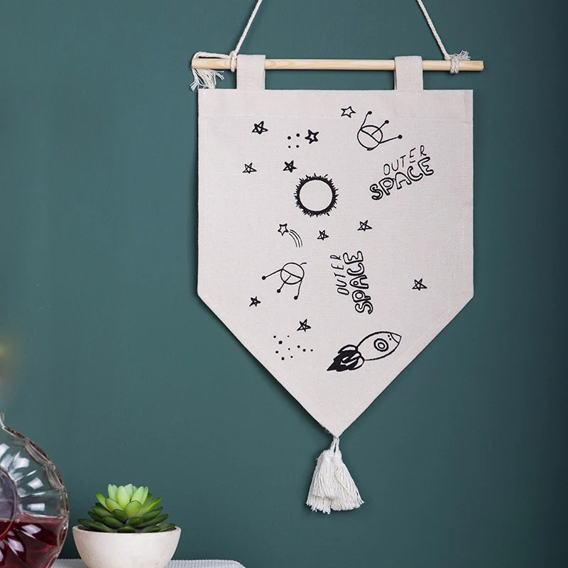 Decorative cotton wall hanging in pennant style with tassels and minimalist prints Stornfield