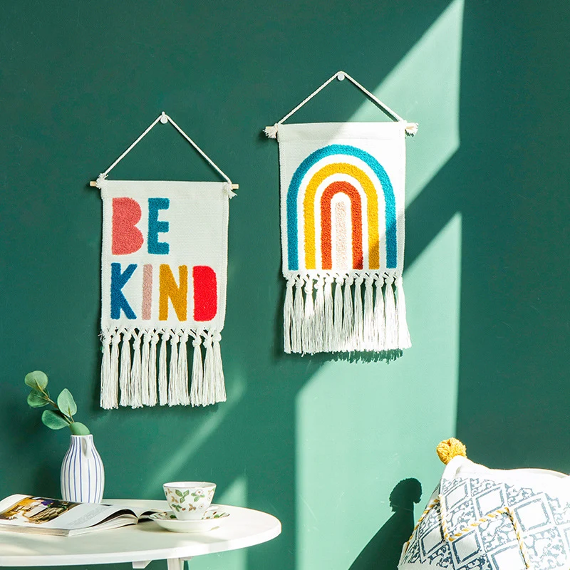 Boho wall hanging made of woven cotton with hand-tufted appliqués and fringes Stornfield