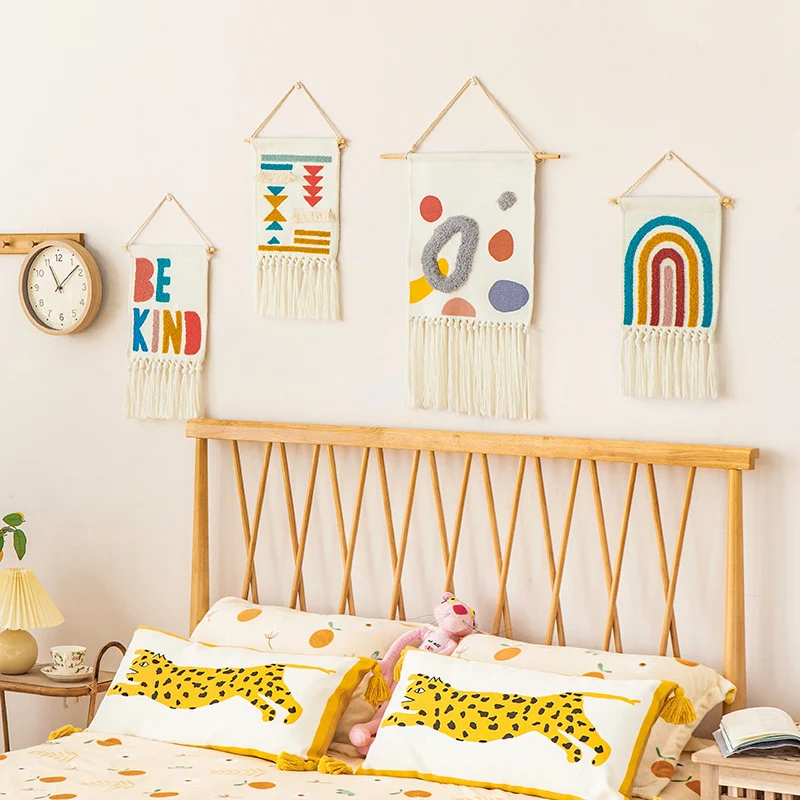Boho wall hanging made of woven cotton with hand-tufted appliqués and fringes Stornfield