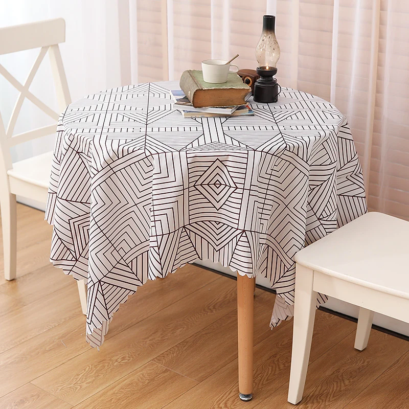 Wipeable tablecloth with fine check pattern, wavy hem and easy-care PVC finish Stornfield