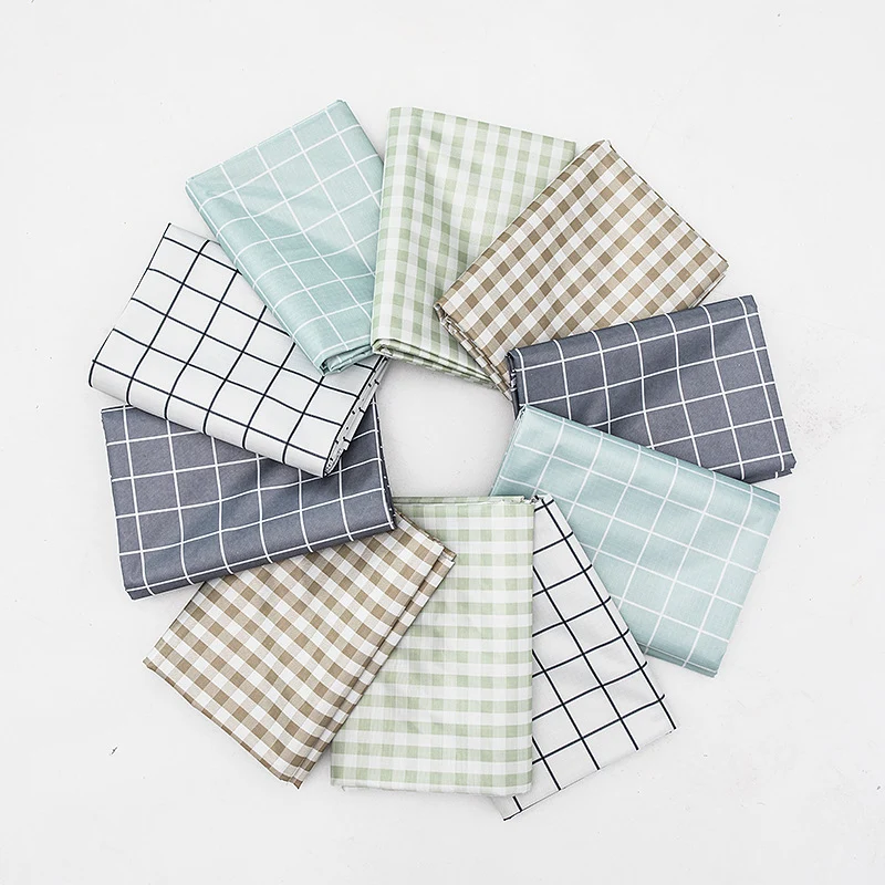 Wipeable tablecloth with fine check pattern, wavy hem and easy-care PVC finish Stornfield
