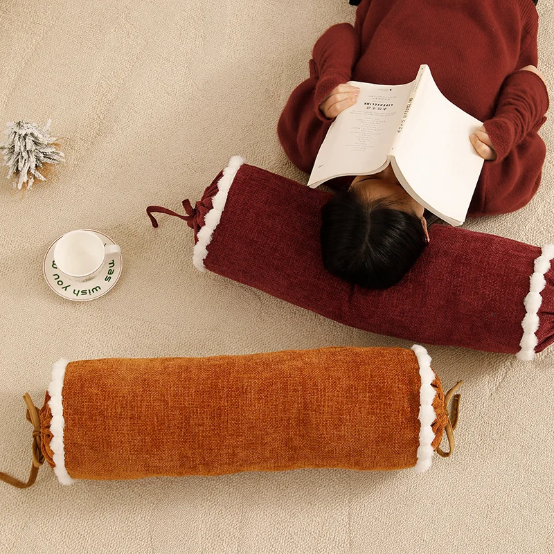 Cylindrical lumbar and neck pillow with velvety chenille surface and crocheted trim Stornfield