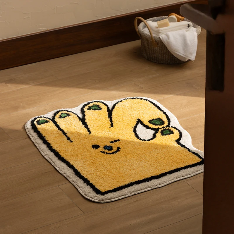 Funny hand-shaped bath mat made of non-slip microfiber plush Stornfield