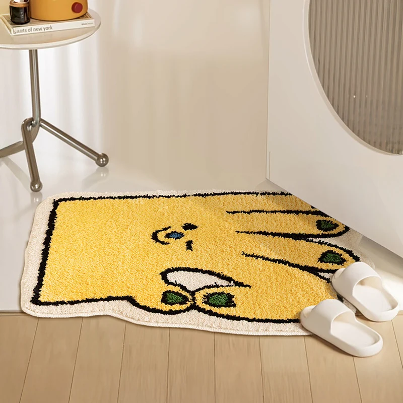 Funny hand-shaped bath mat made of non-slip microfiber plush Stornfield