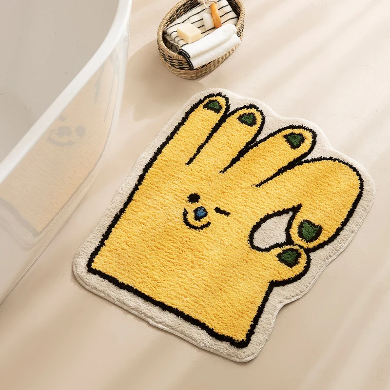 Funny hand-shaped bath mat made of non-slip microfiber plush Stornfield