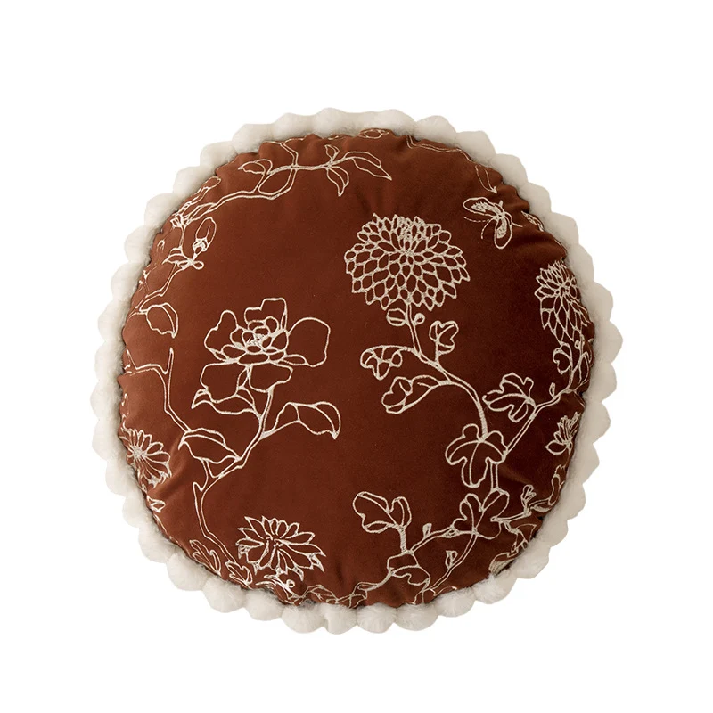 Round decorative cushion with floral embroidery relief look and wavy satin border Stornfield