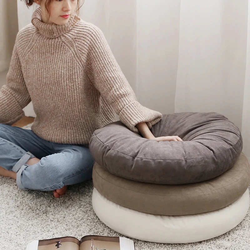 Round seat pouf with soft velvet cover, removable zipper, and shape-stable filling Stornfield