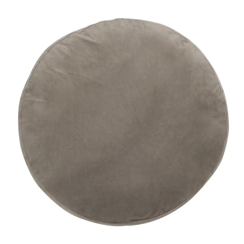 Round seat pouf with soft velvet cover, removable zipper, and shape-stable filling Stornfield