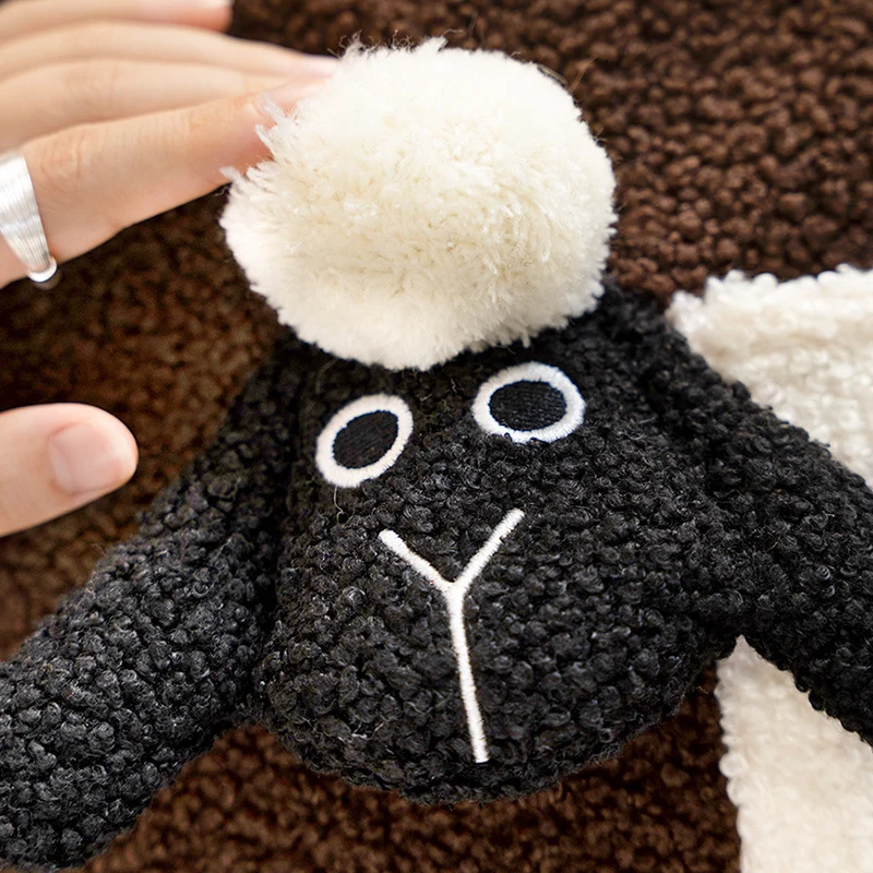 Round plush seat pouf with cute sheep appliqués and teddy fleece Stornfield