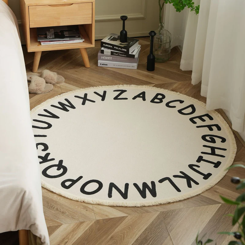 Round woven rug with mandala motif, flat cotton-jute mix and fringes Stornfield