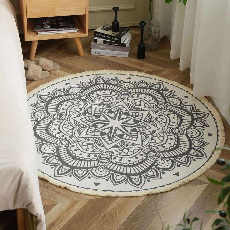 Round woven rug with mandala motif, flat cotton-jute mix and fringes Stornfield