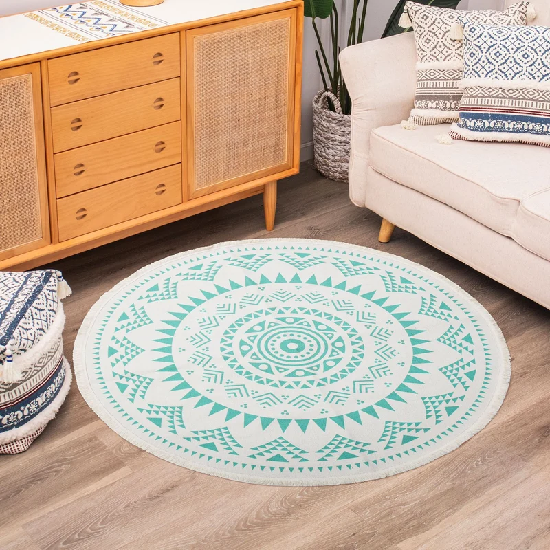 Round woven rug with mandala motif, flat cotton-jute mix and fringes Stornfield