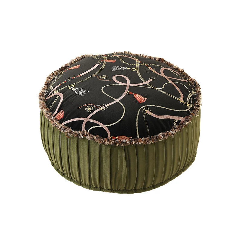 Round decorative floor cushion pouf with velvety printed top, pleated side wall, and fringe edge Stornfield