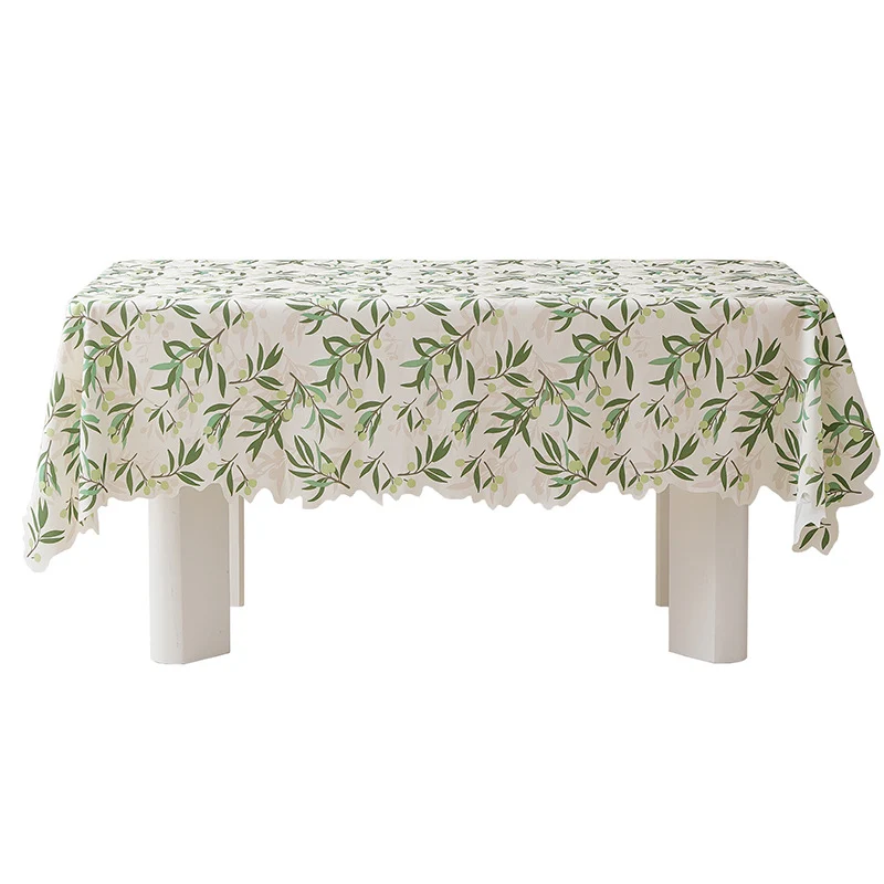 Round wipeable tablecloth with floral cut-out hem Stornfield
