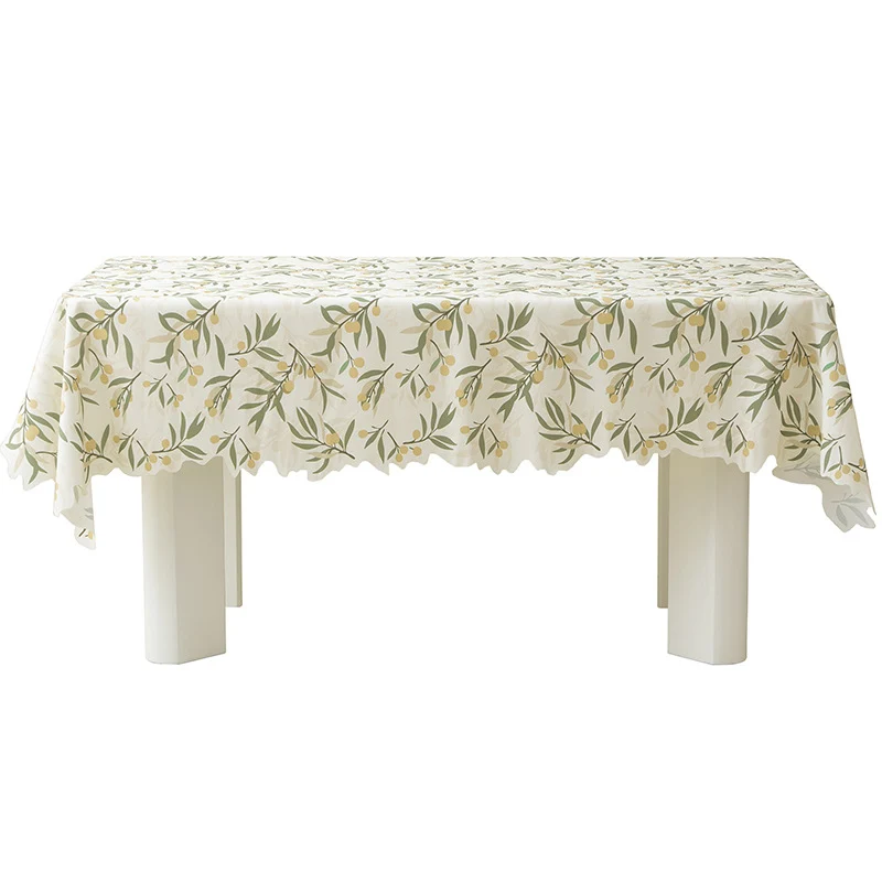 Round wipeable tablecloth with floral cut-out hem Stornfield
