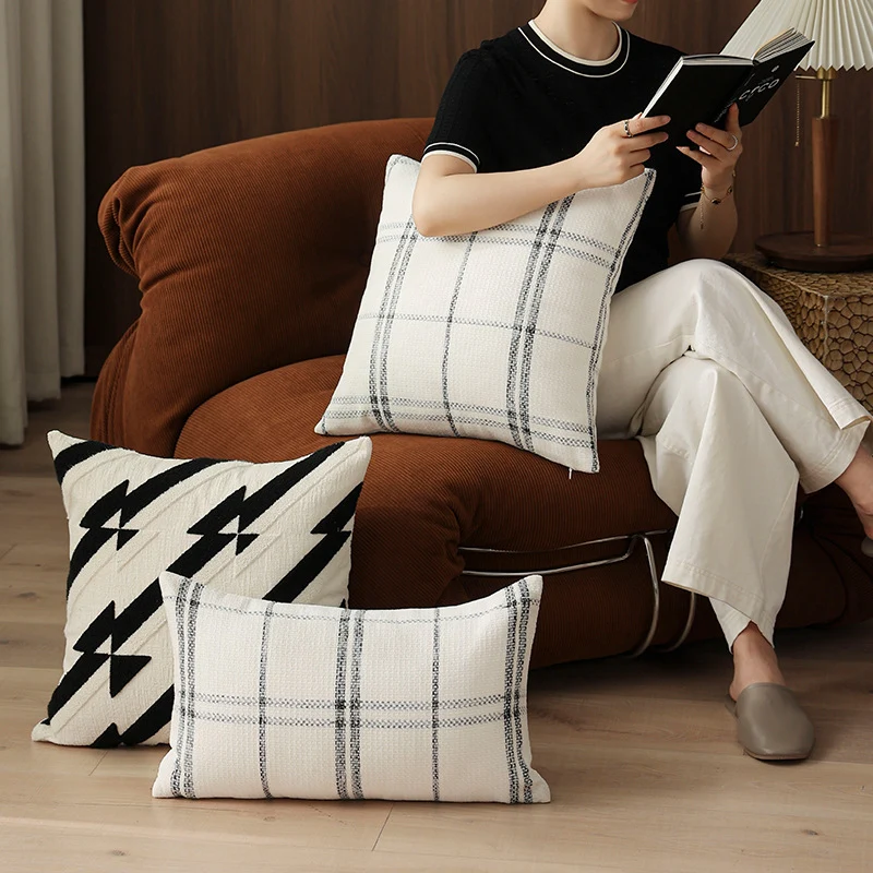 Rectangular woven cushion cover with checkered texture pattern and concealed zipper Stornfield