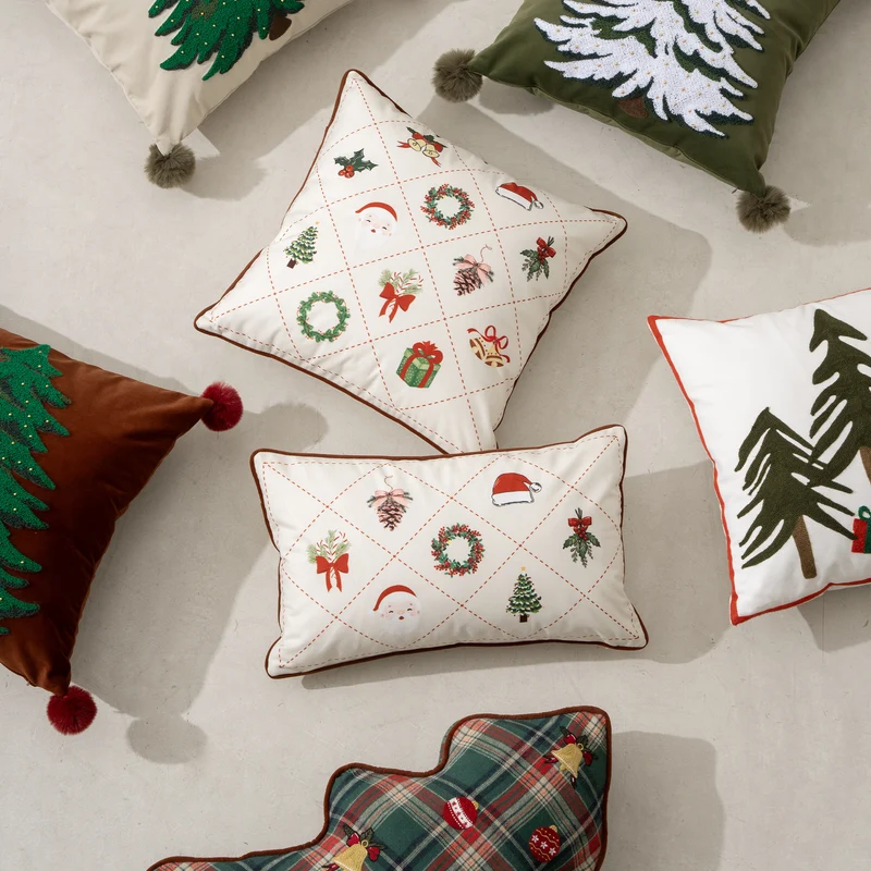 Rectangular decorative pillowcase with Christmas embroidery motifs and piping Stornfield