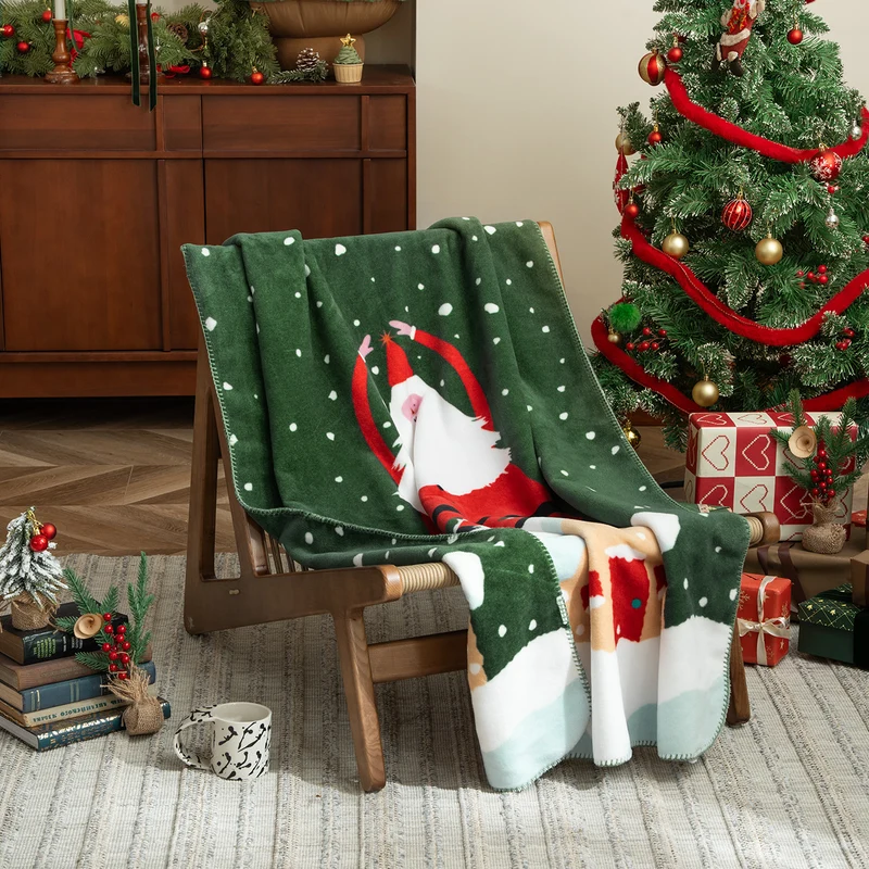 Soft Christmas fleece blanket with gift and gingerbread motif Stornfield