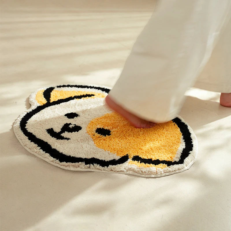 Playful children's rug in cheese shape with tufted chenille surface and non-slip backing Stornfield